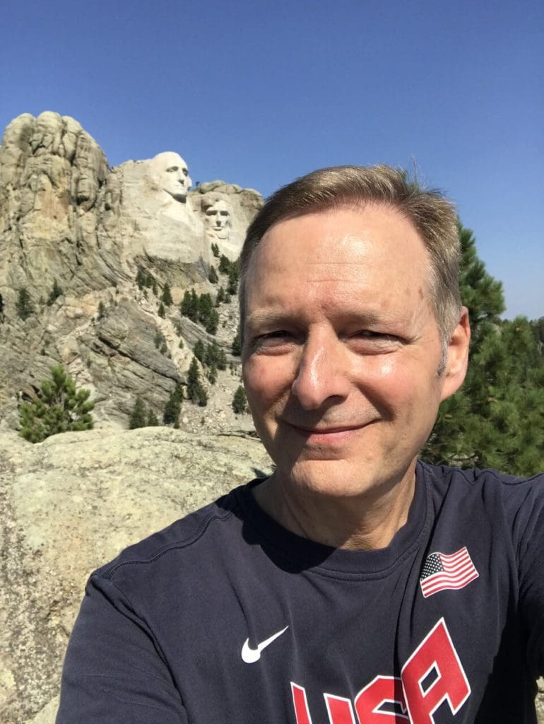 Dr. Kent in front of Mount Rushmore